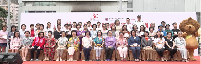 Director of Health (first row, seventh left) and Lazy Lion (second row, first right) participated in a group photo with all the event guests